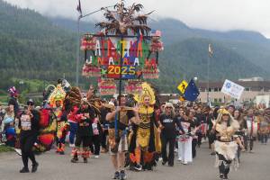 Juneau Ati-Atihan marches towards downtown Juneau in the 2025 Fourth of July Parade. The group was named best of parade. (Natalie Buttner / Juneau Empire)