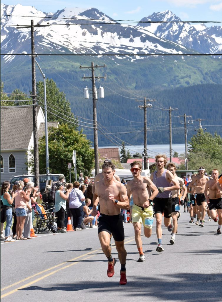 Max King, 45, of Bend, Oregon, works to reel in an early breakaway racer during the mens race at the Mount Marathon Race on July 4, 2025, in Seward, Alaska. (Photo by Jeff Helminiak/Peninsula Clarion)