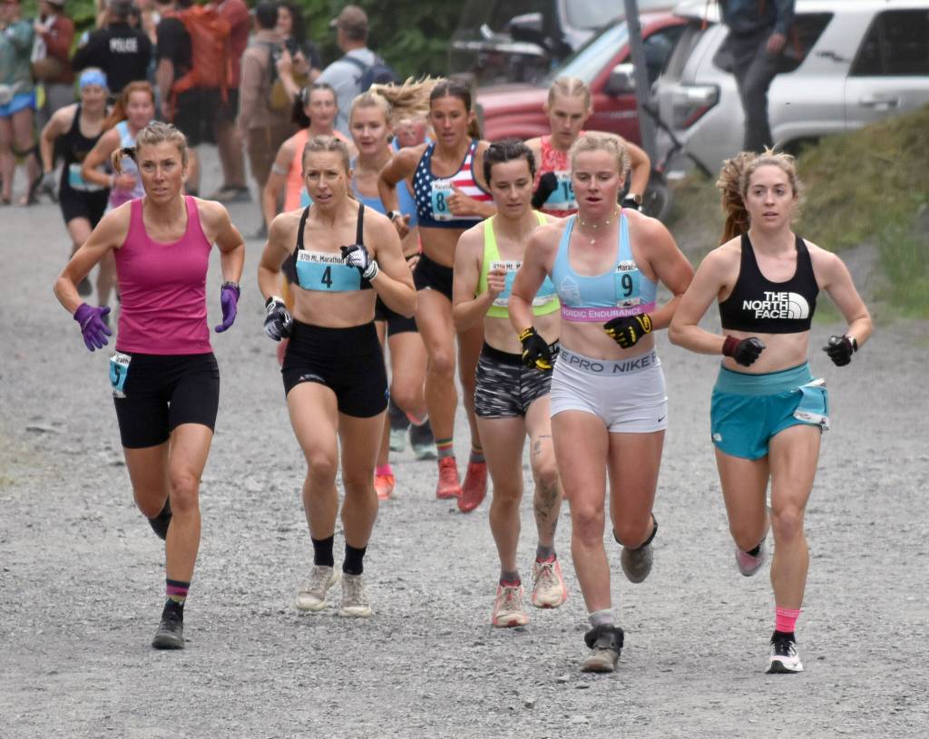 Palmers Christy Marvin, 44; British Columbias Kalie McCrystal, 37; Fairbanks Kendall Kramer, 23; Fairbanks Rosie Fordham, 23; and Anchorages Klaire Rhodes, 27, approach the mountain during the womens race at the Mount Marathon Race on July 4, 2025, in Seward, Alaska. (Photo by Jeff Helminiak/Peninsula Clarion)