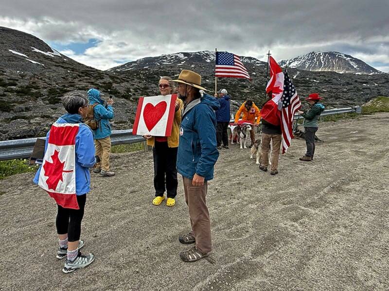 About 50 people attended a rally promoting Canada-United States friendship on the international border near Skagway on July 5. (Bill Glude Photo)
