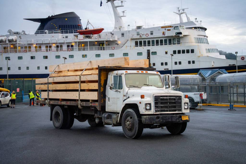 A truck carrying posts and beams from Petersburg arrives in Sitka on the ferry on Monday, June 30. (Photo courtesy of Lee House / Sitka Conservation Society)