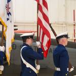 The U.S. Coast Guard Ceremonial Honor Guard leads the presentation of colors on Friday, July 11, 2025. (Jasz Garrett / Juneau Empire)