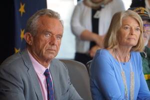 U.S. Health and Human Services Secretary Robert Kennedy Jr. and Sen. Lisa Murkowski, R-Alaska, listen to a question asked at a news conference held Tuesday at the Alaska Native Tribal Health Consortium headquarters in Anchorage. At the event, which was part of Kennedys itinerary during his Alaska trip, the secretary made several claims about vaccines that are disputed by medical experts. (Photo by Yereth Rosen/Alaska Beacon)