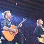 Devon Allman and Duane Betts, of the Allman Betts Band, sing on the River Stage during Salmonfest on Sunday, Aug. 3, 2025, at the Kenai Peninsula Fairgrounds in Ninilchik, Alaska. (Delcenia Cosman/Homer News)