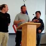In this screengrab, City and Borough of Juneau project managers for the HESCO barrier project  Carleton Shorey, Nick Druyvestein and Jeffrey Thole  speak during a Thursday, Aug. 14, 2025, press conference in the aftermath of the 2025 GLOF.