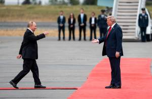 President Donald Trump greets President Vladimir Putin of Russia as they met at Joint Base Elmendorf-Richardson in Anchorage, Alaska, on Friday, Aug. 15, 2025. (Doug Mills/The New York Times)