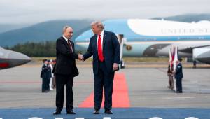 President Donald Trump greets President Vladimir Putin of Russia as they met at Joint Base Elmendorf-Richardson in Anchorage, Alaska, on Friday, Aug. 15, 2025. (Doug Mills/The New York Times)