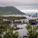 Haiyun Jiang / The New York Times
A container ship docks at Dutch Harbor in Unalaska, Aug. 13. Threatened by the president with political retribution, Republicans agreed to defund public broadcasting, imperiling a lifeline of communication in rural Alaska.