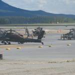 United States Army helicopters including AH-64 Apaches stopped off at the Whitehorse airport on Aug. 13. (Jim Elliot/Yukon News)