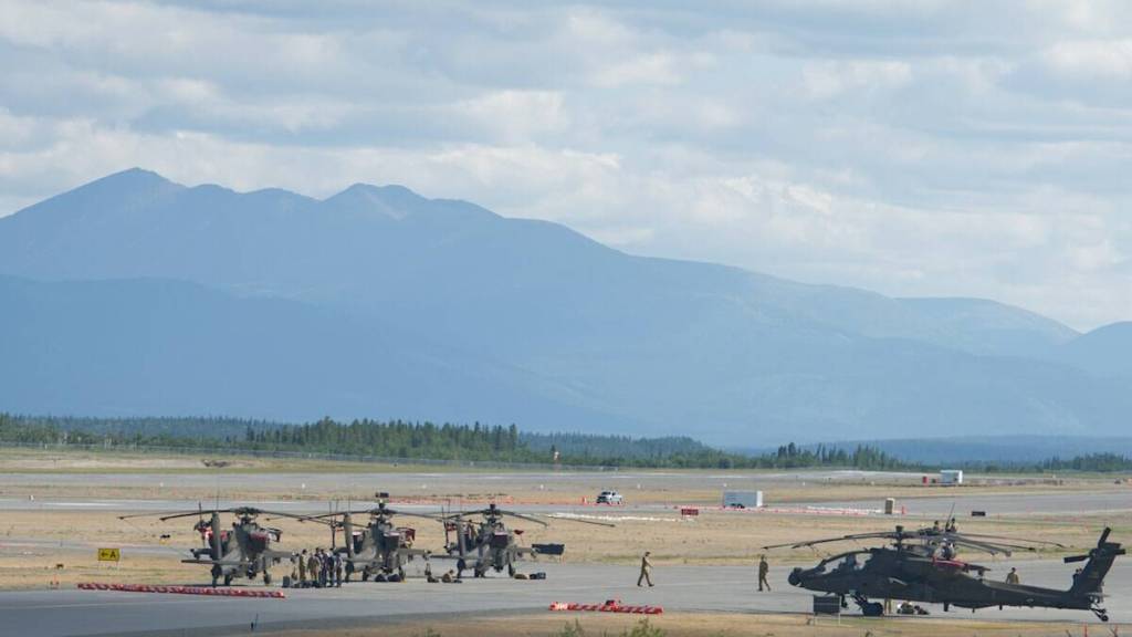 United States Army helicopters including AH-64 Apaches stopped off at the Whitehorse airport on Aug. 13, 2025. (Jim Elliot/Yukon News)