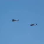 A pair of United States Army UH-60 Black Hawks followed AH-64 Apaches into the Whitehorse airport on Aug. 13, 2025. (Dana Hatherly/Yukon News)