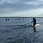 Local fishermen use dipnets to catch salmon at the mouth of Alaskas Kenai River, where it runs into Cook Inlet, on July 21, 2025. The looming energy crisis in Anchorage offers a lesson in the downsides of relying on fossil fuels. (Nathaniel Wilder/The New York Times)