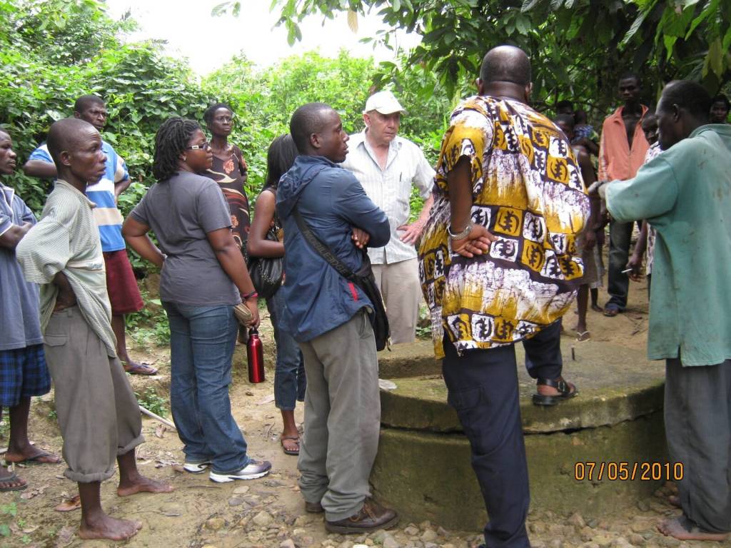 Lew Shapiro, in white hat, inspects a potential water system repair project in Ghana on July 5, 2010. Photo by Josie Sam.