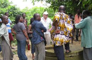 Lew Shapiro, in white hat, inspects a potential water system repair project in Ghana on July 5, 2010. (Photo by Josie Sam)