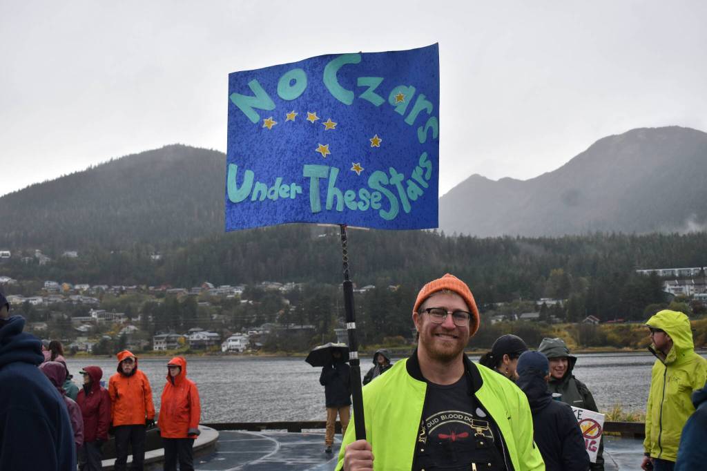 One attendee of the No Tsars, No Kings protest holds a sign that says, No Czars Under These Stars. (Mari Kanagy/Juneau Empire)