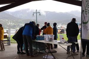 Ellie Ruel / Juneau Empire File
Participants grab placards, flowers and hearts at Marine Park before the Cancer Survivors Day walk on June 8, 2025.