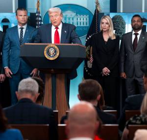 President Donald Trump announces that he is assuming control of Washingtons Metropolitan Police Department and deploying the National Guard in the nations capital, citing high crime rates at the White House on Monday, Aug. 11, 2025. (Doug Mills/The New York Times)