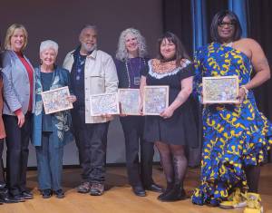 Yuxgitisiy George Holly and Lorrie Gax.áan.sán Heagy (center left and right) stand alongside Lieutenant Governor Nancy Dahlstrom (left) and other honorees at the Governors Arts and Humanities Award ceremony in Anchorage on Oct. 28, 2025. Holly won the Margaret Nick Cooke Award for Alaska Native Arts and Languages, and Heagy won the award for Individual Artist. (photo courtesy of Yuxgitisiy George Holly)
