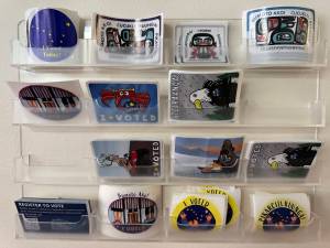 I voted stickers are seen on display in the headquarters offices of the Alaska Division of Elections in Juneau on Tuesday, Nov. 12, 2024. (Photo by James Brooks/Alaska Beacon)