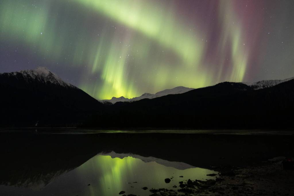 The aurora borealis is seen from Mendenhall Lake in Juneau on Nov. 12, 2025. A series of solar flares caused unusually bright displays of the northern lights across Alaska Tuesday and Wednesday nights. (Chloe Anderson/Peninsula Clarion)