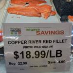 Copper River sockeye salmon fillets are displayed at New Sagaya Midtown Market in Anchorage on June 12, 2025. Sockeye salmon is also called red salmon. This year, sockeye salmon accounted for 58% of the value of Alaskas total commercial salmon harvest, though it reprsented only about a quarter of the fish caught. (Photo by Yereth Rosen/Alaska Beacon)