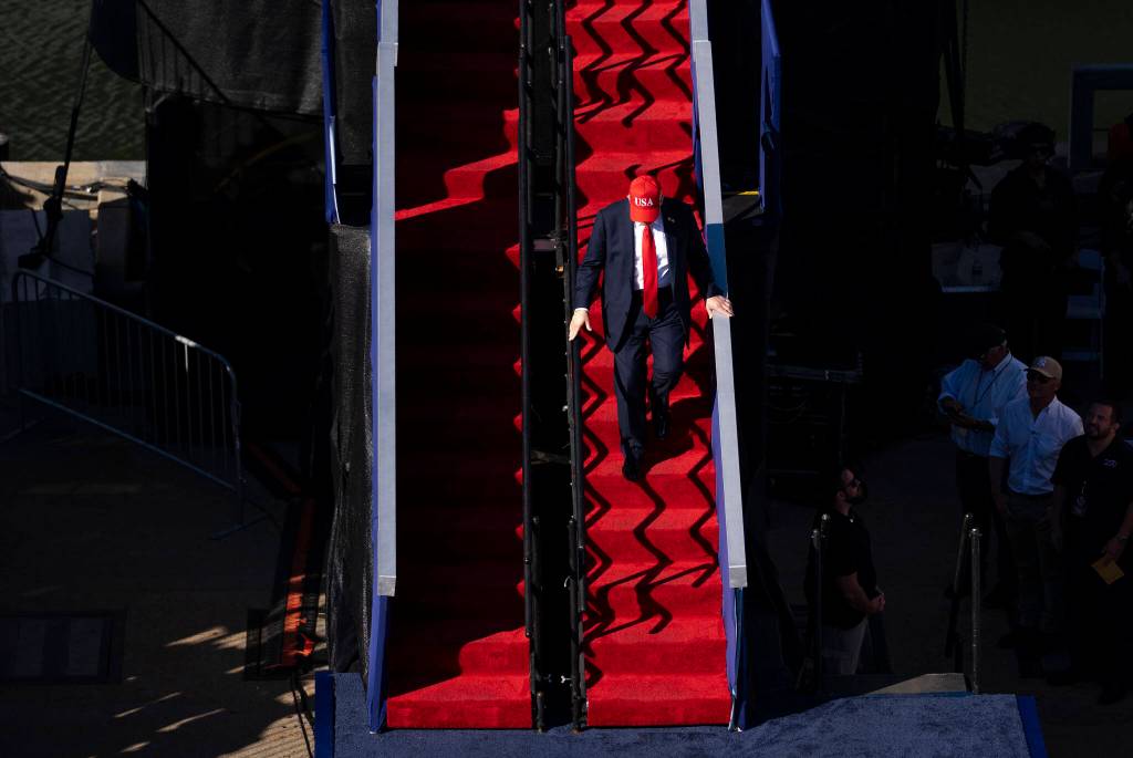 Doug Mills/The New York Times 
President Donald Trump disembarks the USS Harry S. Truman before delivering remarks for the Navys 250th anniversary in Norfolk, Va., Oct. 5, 2025.