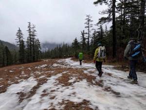 Hiking down from Dan Moller cabin in mid-January 2025. (photo courtesy John Harley)