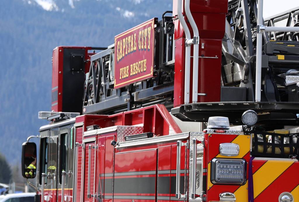 A Capital City Fire/Rescue truck drives in the Mendenhall Valley in 2023. (Clarise Larson / Juneau Empire file photo)