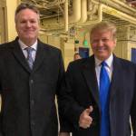 Dunleavy and Trump pose for a photo during a presidential stopover at Anchorages military base in 2019. (Office of the Governor)