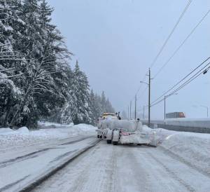 Mari Kanagy/Juneau Empire
A tow plow drives along Glacier Highway on Monday, Jan. 5.