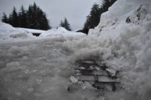 The City and Borough of Juneau encourages residents to assist in the efforts to clear storm drains as heavy rainfall is forecast (Mari Kanagy/Juneau Empire)