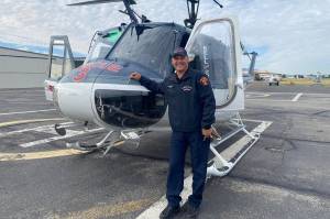 Thomas Hatley stands before a helicopter. He was announced the new fire chief for Capital City Fire and Rescue on Friday, Jan. 16, 2025. (Thomas Hatley photo)