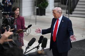 Kenny Holston/The New York Times
President Donald Trump speaks to reporters as he departed the White House en route to Joint Base Andrews, bound for a trip to Britain, Sept. 16, 2025. In his inauguration speech, he vowed to immediately stop all government censorship and bring back free speech to America.