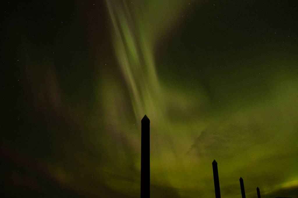 The northern lights are pictured at the North Douglas launch ramp late Monday, Jan. 19. A geomagnetic storm caused an unusually bright display Monday night and into Tuesday morning. (Chloe Anderson/Juneau Empire)
