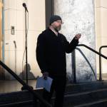Sen. Jesse Kiehl, D-Juneau, speaks during a student-led protest against the LNG pipeline on Jan. 24, 2026. Dozens of Juneauites gathered outside the Alaska State Capitol building to participate in the demonstration. (Chloe Anderson / Juneau Empire)