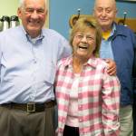 At the Elvey Building, home of UAFs Geophysical Institute, Carl Benson, far right, and Val Scullion of the GI business office attend a 2014 retirement party with Glenn Shaw. Photo by Ned Rozell