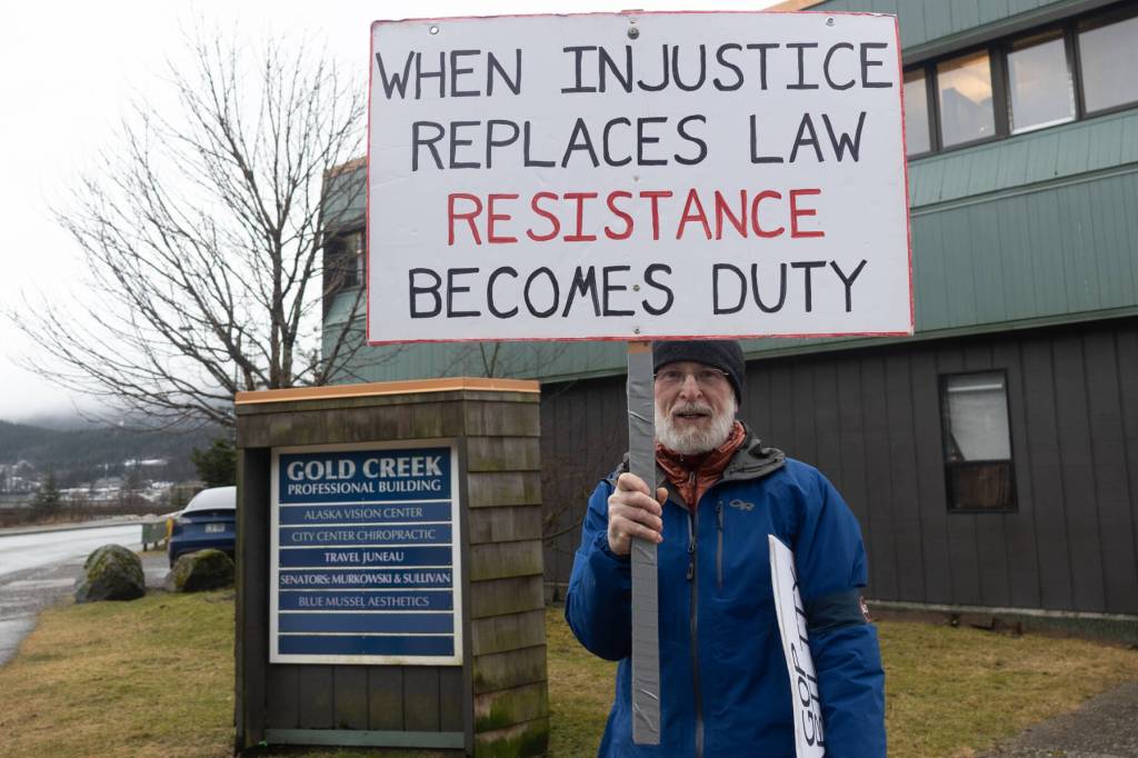 Paul Desloover participates in a peaceful protest outside Senator Lisa Murkowskis Juneau office on Feb. 4, 2026. (Chloe Anderson/Juneau Empire)(Chloe Anderson/Juneau Empire)