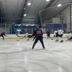 The Juneau-Douglas High School: Yadaa.at Kalé Crimson Bears won fourth place during the Division II Hockey State championships in Palmer last weekend. Photo courtesy of Rapi Sotoa