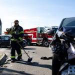 Engineer Logan Balstad cleaning up after a car crash.