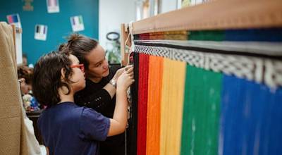 Lily Hope and her daughter Ella Hope creating the pride robe.