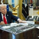 Doug Mills/The New York Times
President Donald Trump with a model of his proposed ballroom, in the Oval Office of the White House in Washington, Dec. 12, 2025.