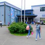 Photo by Corinne Smith/Alaska Beacon 
Students arrive for the first day of school at Harborview Elementary School in Juneau on Aug. 15, 2025. Longtime school administrator Molly Yerkes will be taking over as the principal for Harborview Elementary School and the Tlingit Culture, Language and Literacy Program
