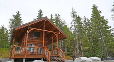 The National Forest Foundation, U.S. Department of Agriculture Forest Service, and the Central Council of the Tlingit and Haida Indian Tribes of Alaska gathered on June 24 for a ribbon-cutting ceremony marking the new Sítʼ Yá Hítʼ Cabin at Mendenhall Campground. (Tongass National Forest)