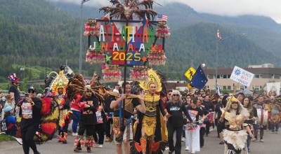 Juneau Ati-Atihan marches towards downtown Juneau in the 2025 Fourth of July Parade. The group was named best of parade. (Natalie Buttner / Juneau Empire file photo)