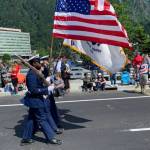 Coast Guardsmen march in the Juneau Fourth of July parade. (Dana Zigmund / Juneau Empire file photo)
