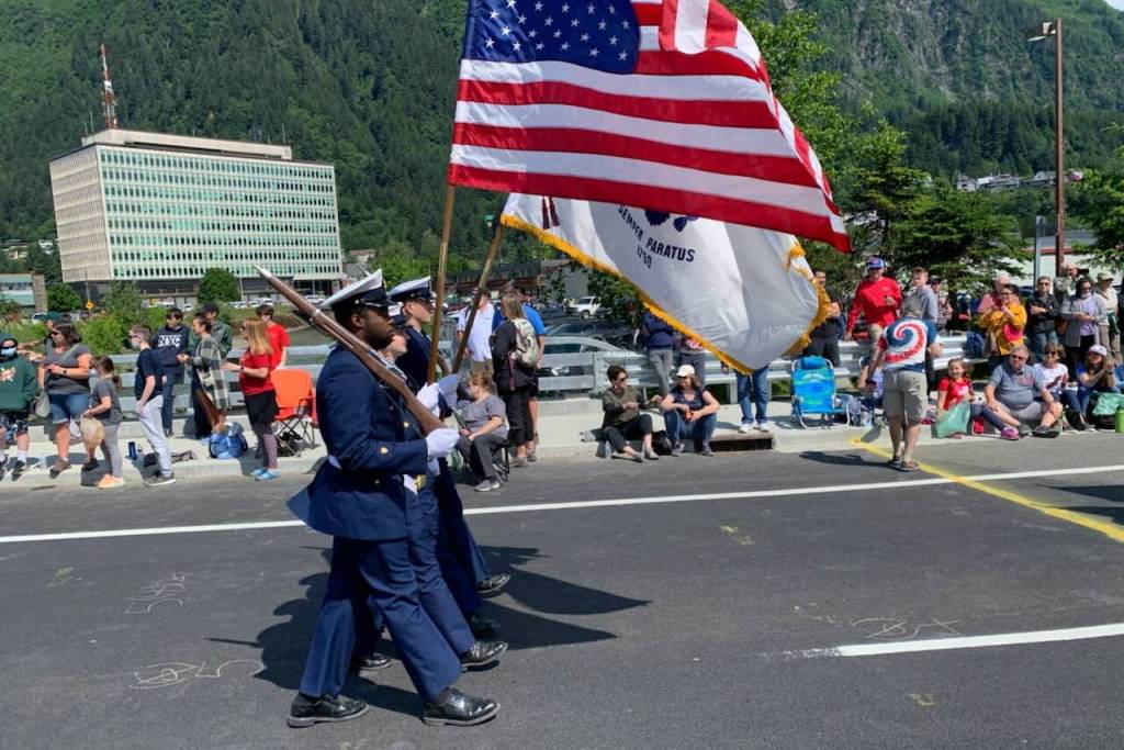 Coast Guardsmen march in the Juneau Fourth of July parade. (Dana Zigmund / Juneau Empire file photo)