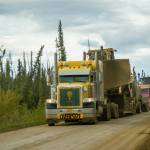 Large trucks traveling to and from Deadhorse and Prudhoe Bay dominate the Dalton Highway. (Photo by Arthur T. LaBar)