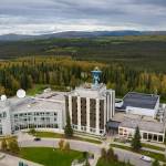Photo by Eric Marshall 
The C.T. Elvey Building, center, is home to the University of Alaska Fairbanks Geophysical Institute. At left in this 2025 photograph is the Syun-Ichi Akasofu Building, which houses many Geophysical Institute researchers, including those of the Alaska Center for Unmanned Aircraft Systems Integration. The Akasofu Building is also home to another UAF research unit, the International Arctic Research Center.