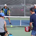 Mario Bottazzini, front left, and Jay Boucher take on Gabriel-Catalin Durbalau, back left, and Dusan Gavrilovits in 55-Plus B.C. Games pickleball action on Friday, Sept. 13. (Karl Yu/News Bulletin)