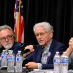 Democrat Tom Begich discusses his education policy platform, with Independent Randy Hoffbeck (left) and Republican Click Bishop (right) at an education debate on July 30, 2026. (Photo by Corinne Smith/Alaska Beacon)